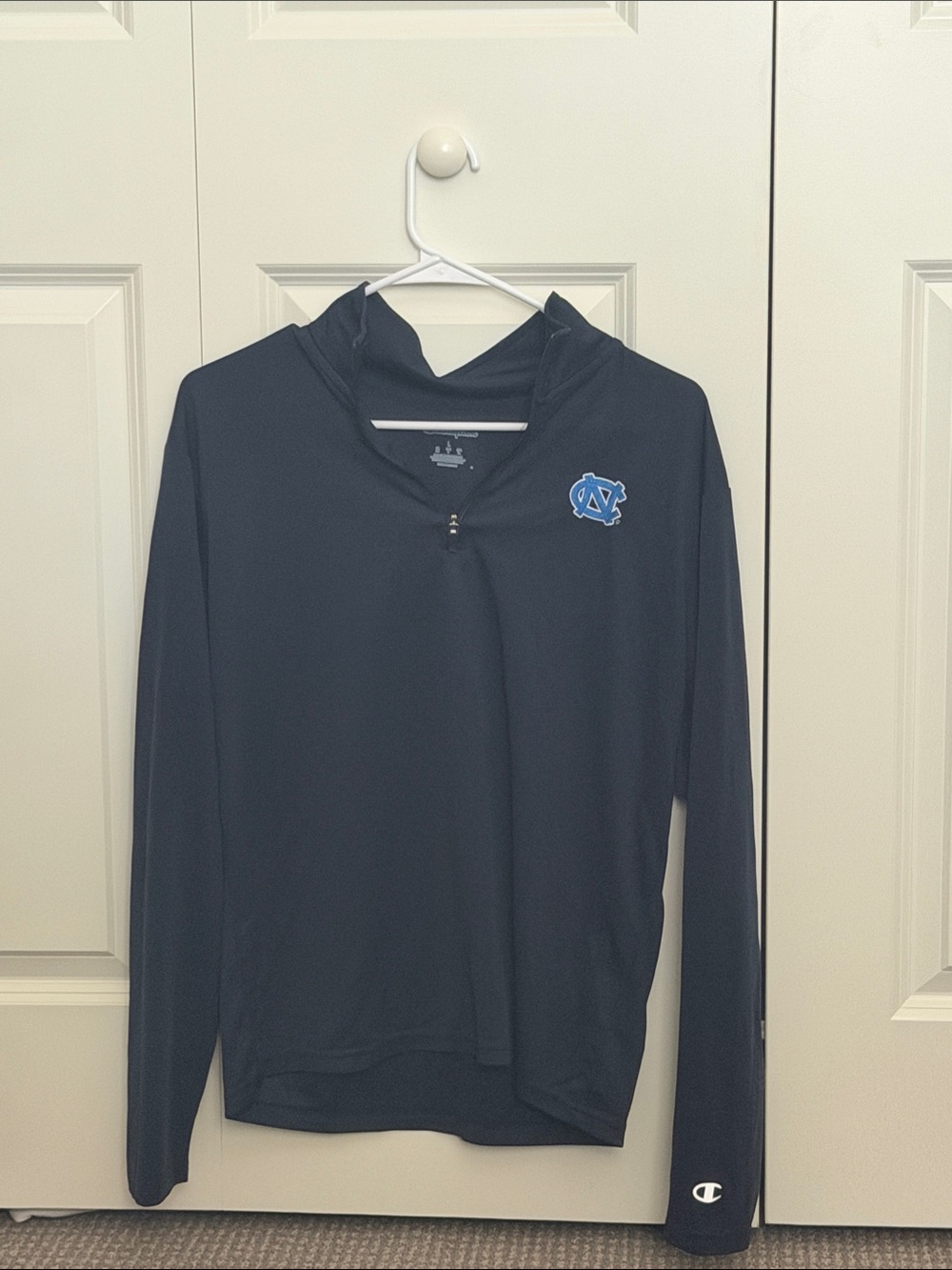 Champion Navy zip with Light Blue UNC Logo